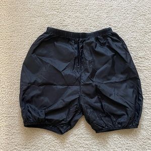Body wrapper trash bag shorts, size medium, black color